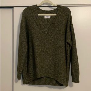 Green knitted v neck sweater